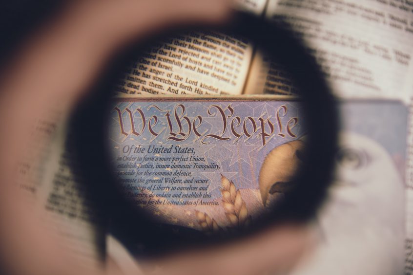 Magnifying glass looking at Declaration of Independence