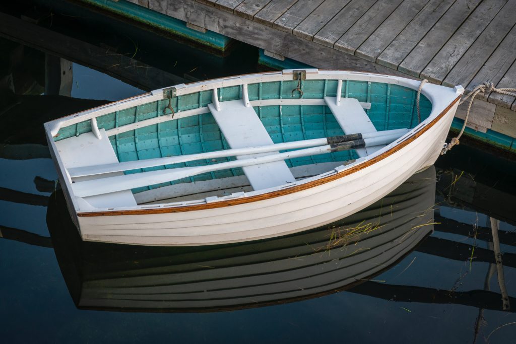Rowboat moored to pier